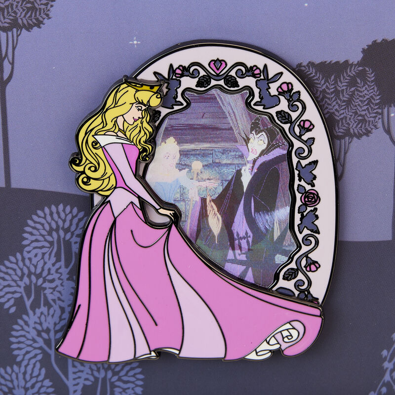 Image of our Sleeping Beauty 3" Lenticular Pin, showcasing Aurora in her pink dress looking at the lenticular showing a scene of Maleficent and Aurora pricking her finger.